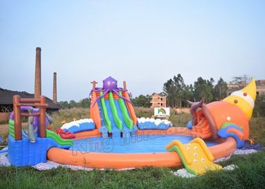 屋外ポリ塩化ビニールの防水シート3枚のスライドが付いている土地の膨脹可能な水公園のゲーム