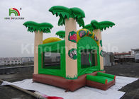 5x4.5mの緑のココヤシの木の子供の膨脹可能な跳躍の城/爆発の跳ね上がりの家